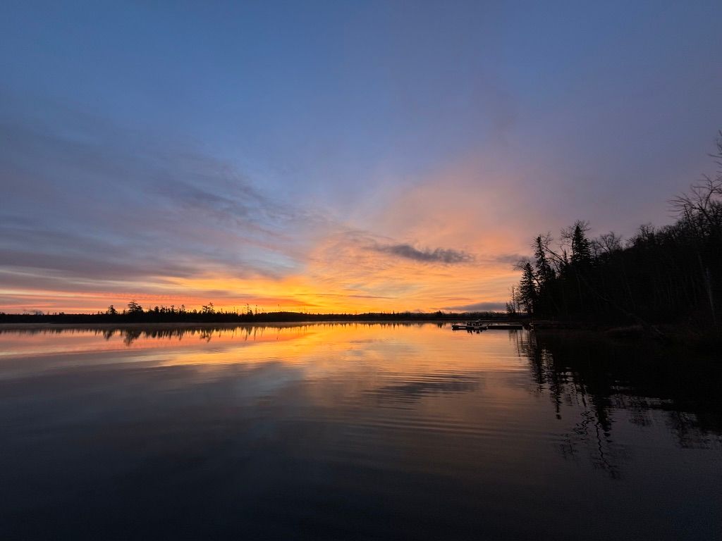 Sunset reflected on a still lake